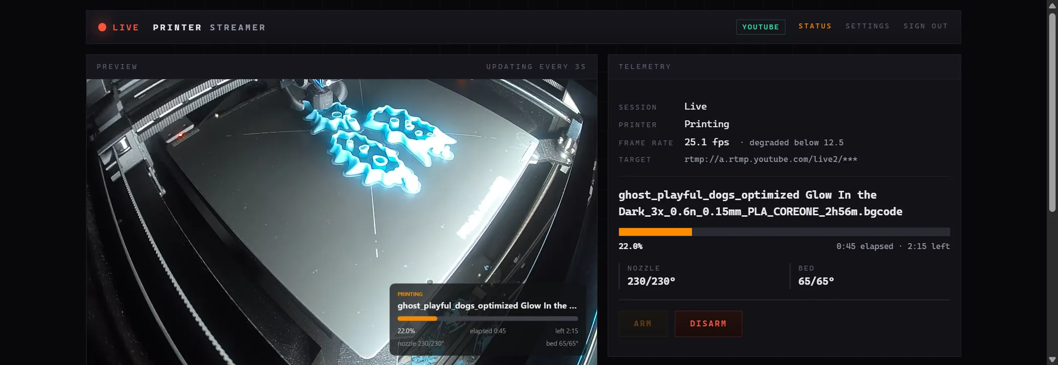 The control panel mid-print, showing the live camera preview, a frame-rate readout and the print's telemetry